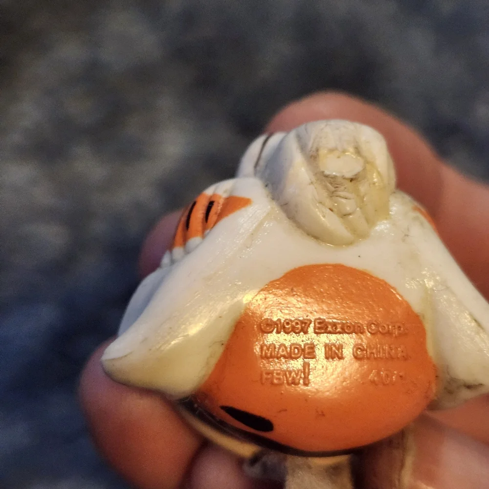 vintage 1997 Exxon Tiger promotional keychain, featuring the company's tiger